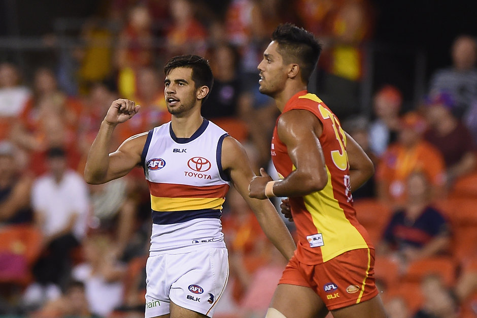 AFL 2016 NAB Challenge - Gold Coast v Adelaide GOLD COAST, AUSTRALIA - MARCH 11: Wayne Milera of the Crows celebrates kicking a goal during the 2016 NAB Challenge match between the Gold Coast Suns and the Adelaide Crows at Metricon Stadium on March 11, 2016. (Photo by Matt Roberts/AFL Media)